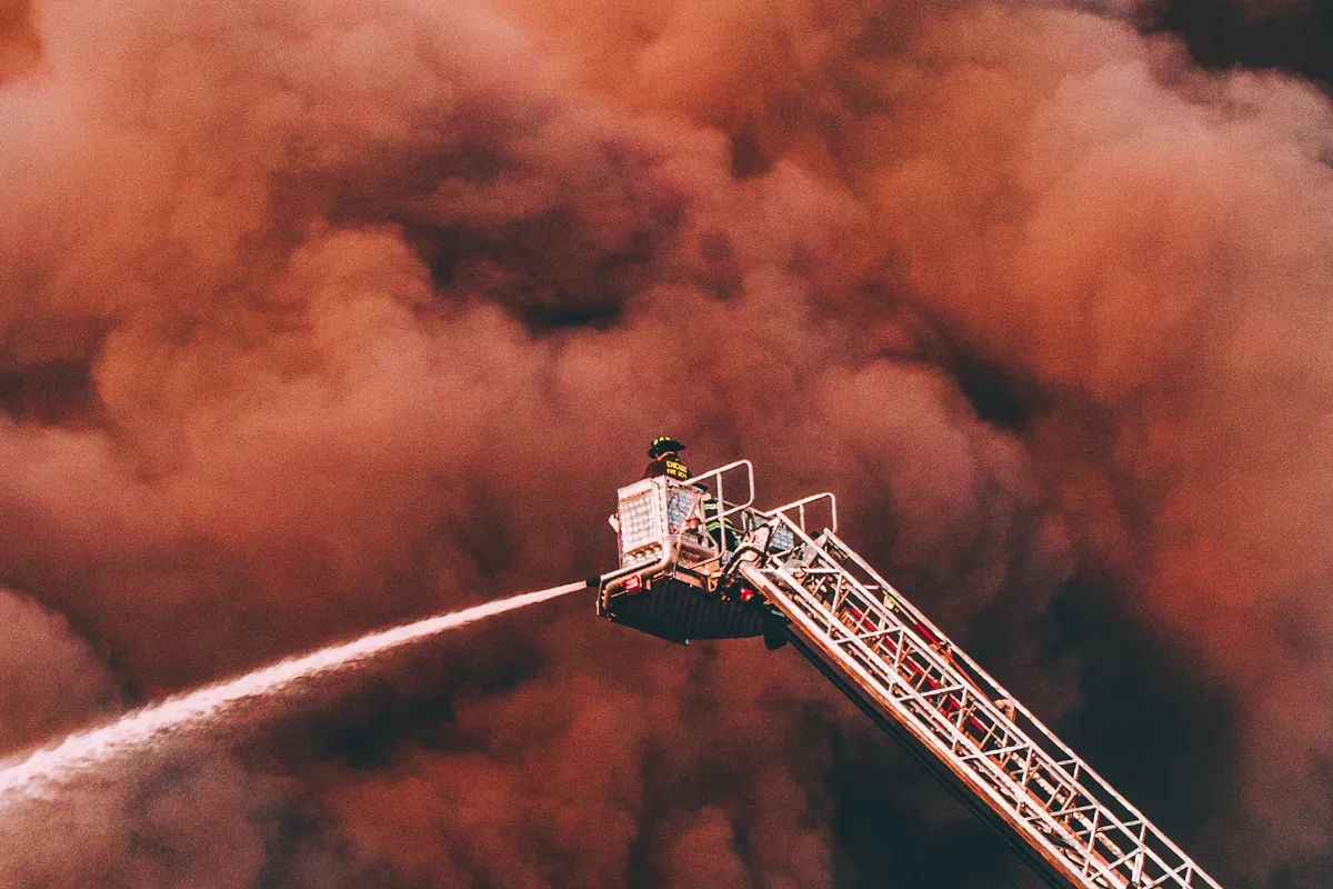 A fire water jet from an aerial ladder